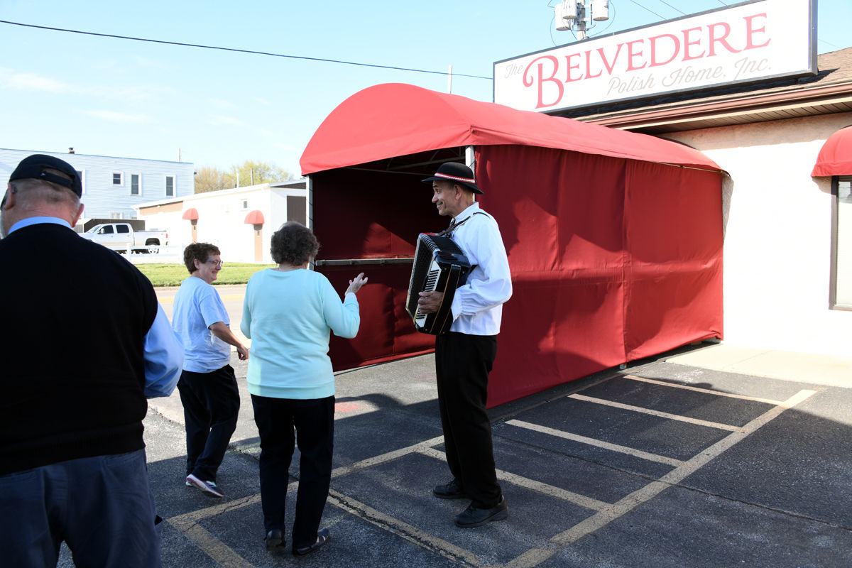 030 Brenda Spencer and Lenora Larkin are welcomed to the Belvedere Polish Center.JPG